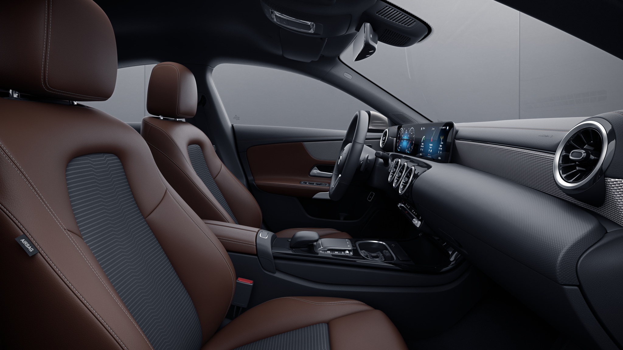 	Habitacle de la Mercedes CLA avec une sellerie Similicuir ARTICO  tissu Fléron bicolore - noir marron bahia 