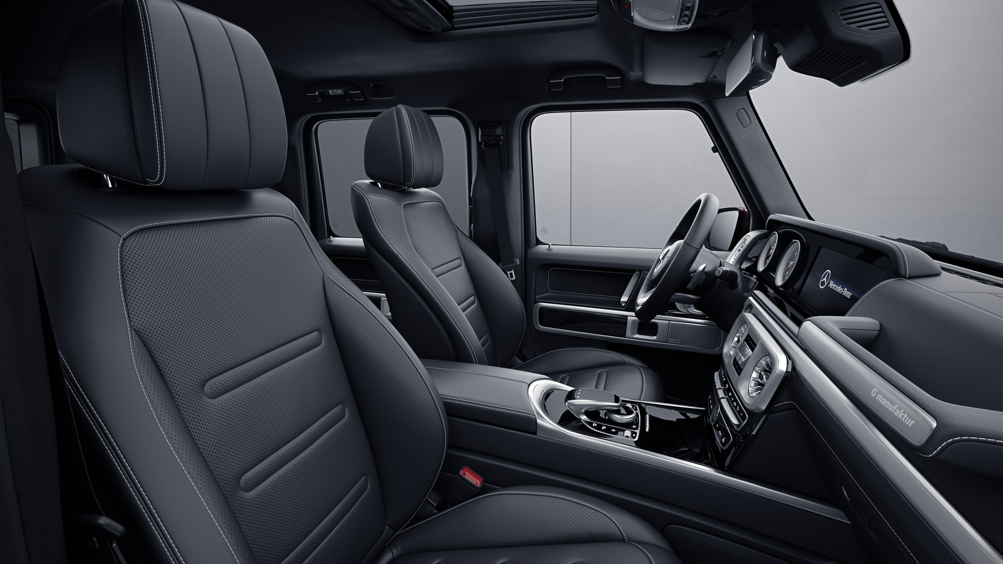 Habitacle de la Mercedes Classe G avec une Sellerie Cuir Nappa G manufaktur - Noir avec surpiqure contrastée blanche
