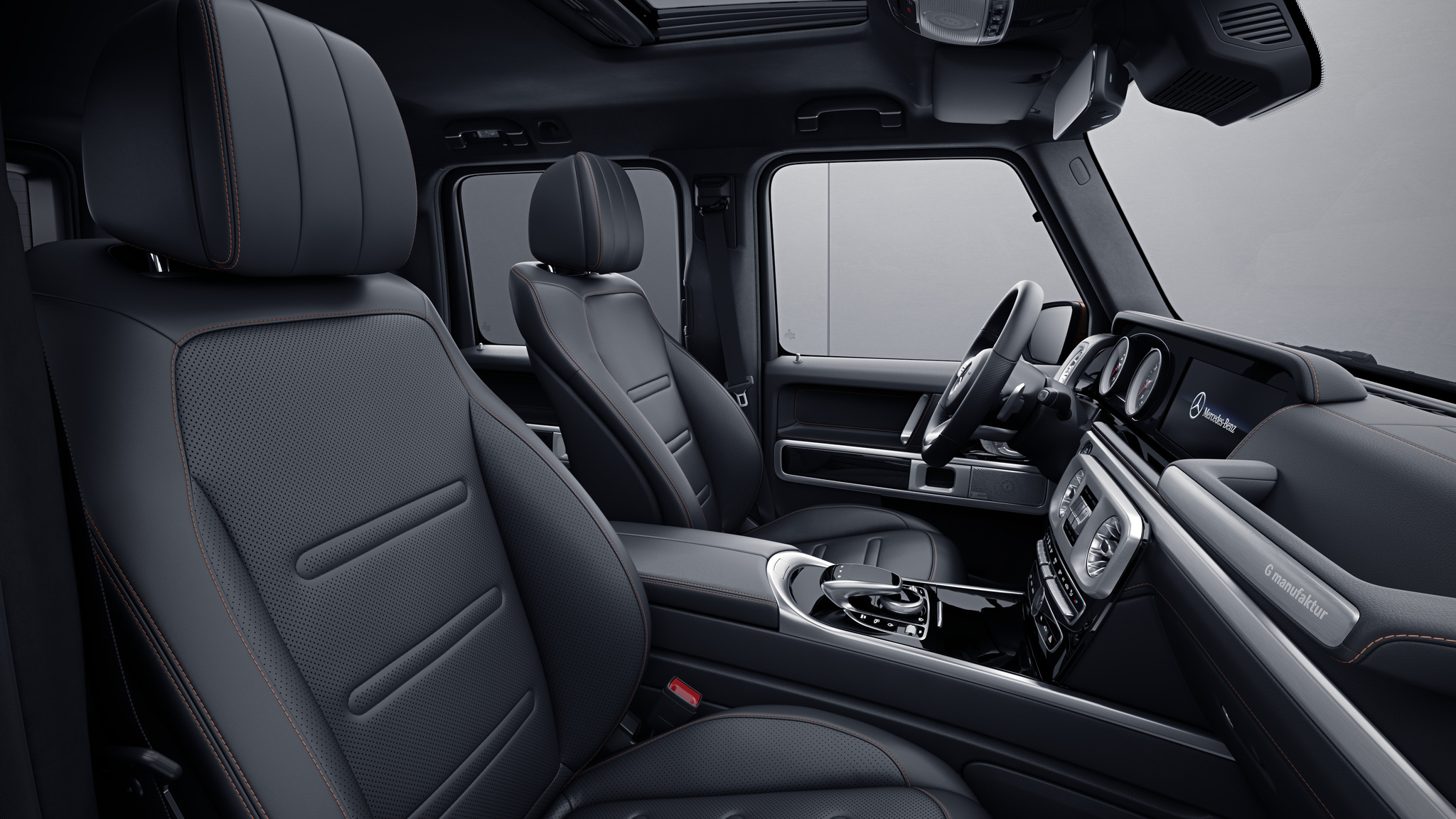 	Habitacle de la Mercedes Classe G avec une Sellerie Cuir Nappa G manufaktur - Noir avec surpiqure contrastée bronze