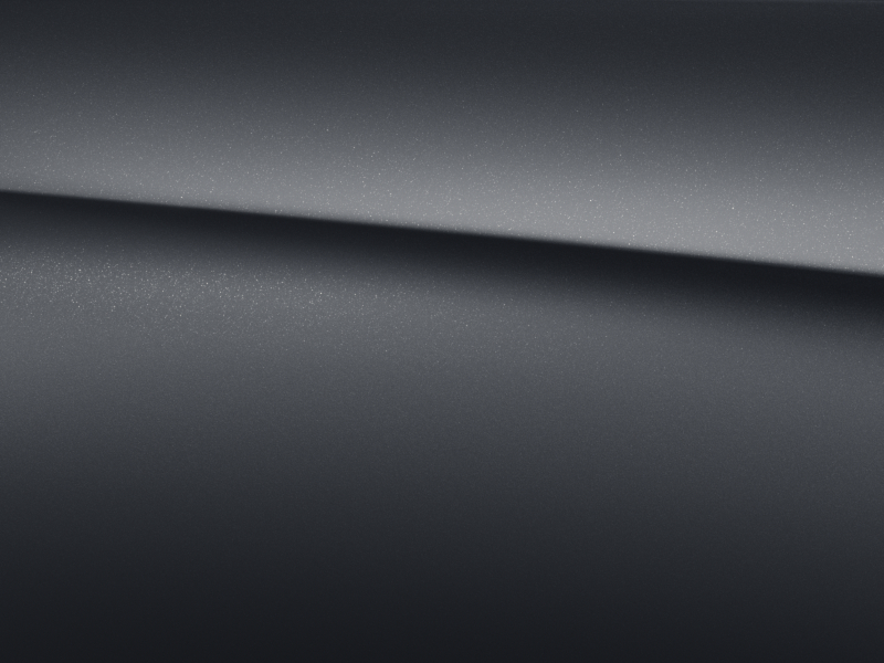 Vue de trois quarts de profil de la Mercedes-Benz Classe C Coupé avec la Peinture designo - Gris graphite magno
