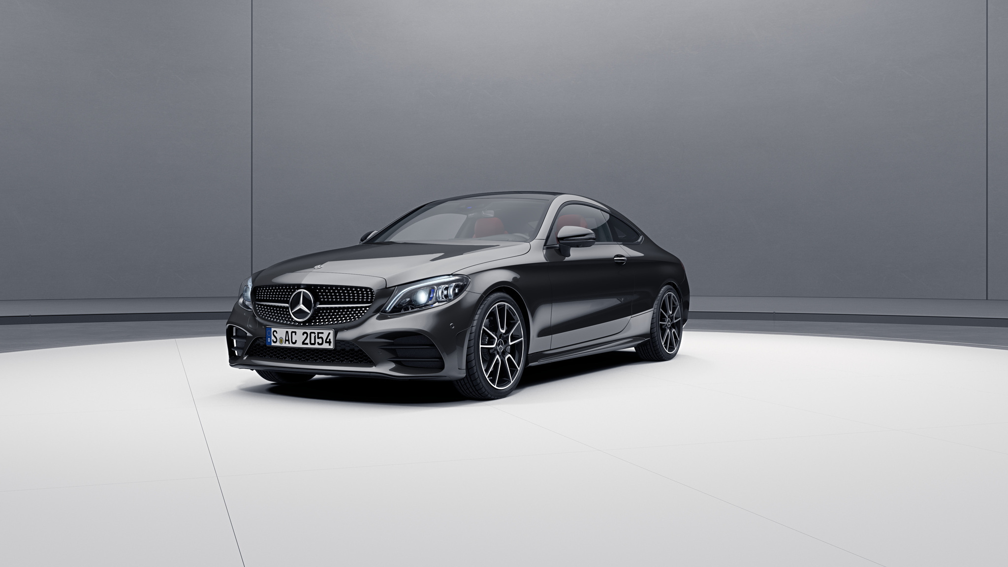 Vue de trois quarts de profil de la Mercedes-Benz Classe C Coupé avec la peinture Métallisé - gris graphite