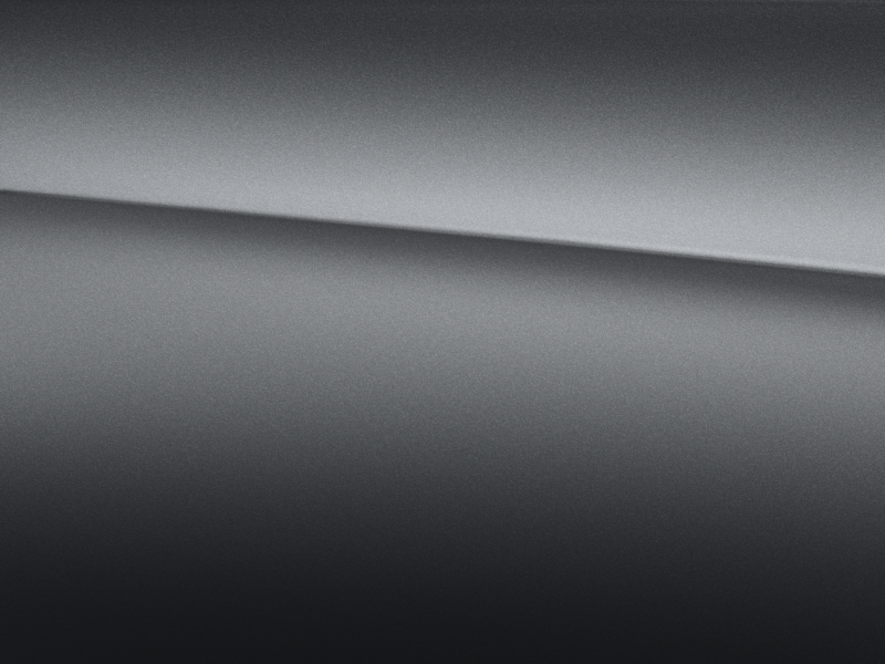 Vue de trois quarts de profil de la Mercedes-Benz Classe C Coupé avec la peinture designo - gris sélénite magno designo