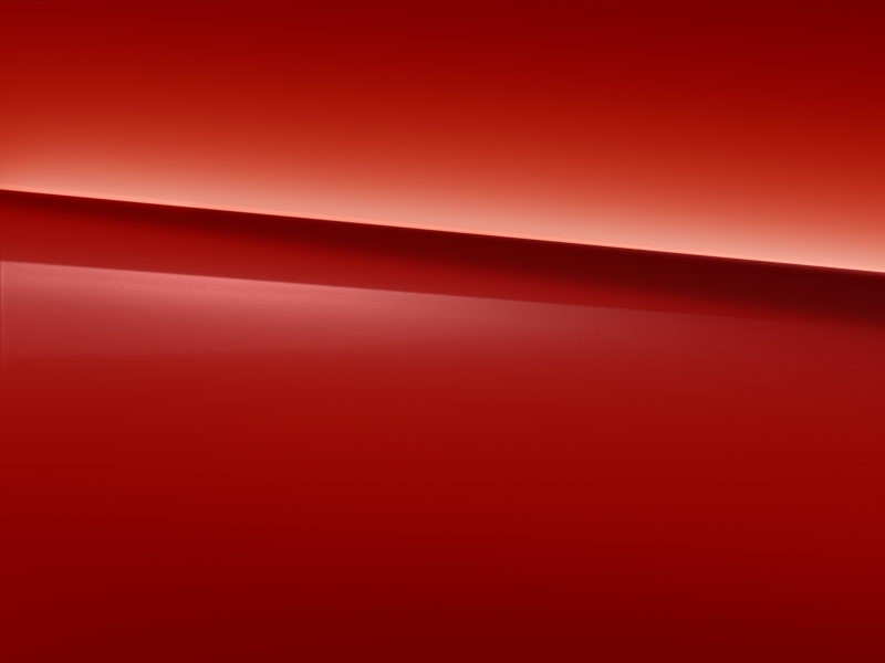 Vue de trois quarts de profil de la Mercedes-Benz classe G avec la peinture standard - rouge jupier standard G manufaktur