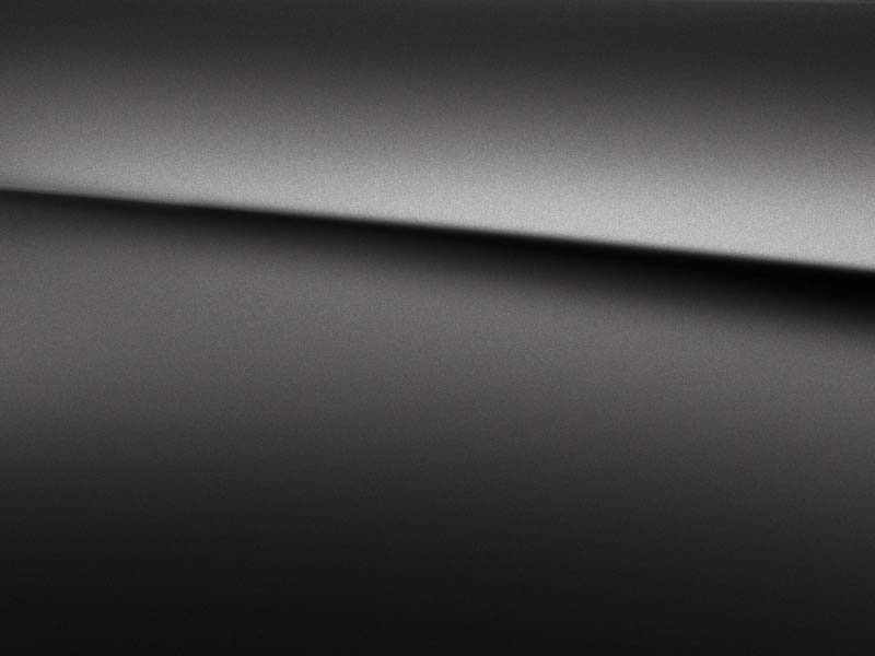 Vue de trois quarts de profil de la Mercedes Classe A avec la peinture designo - Gris Montagne Magno