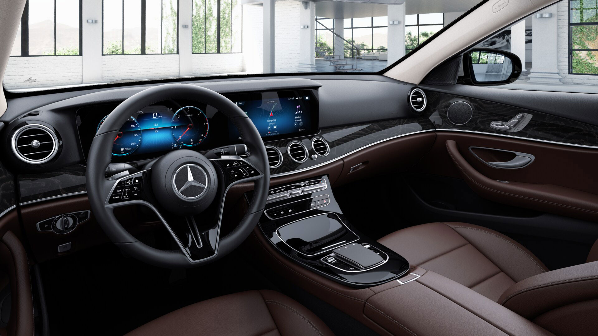 Poste de conduite de la Mercedes Classe E Berline Avantgarde Plus avec vue sur l’écran tactile, sellerie et la console centrale 