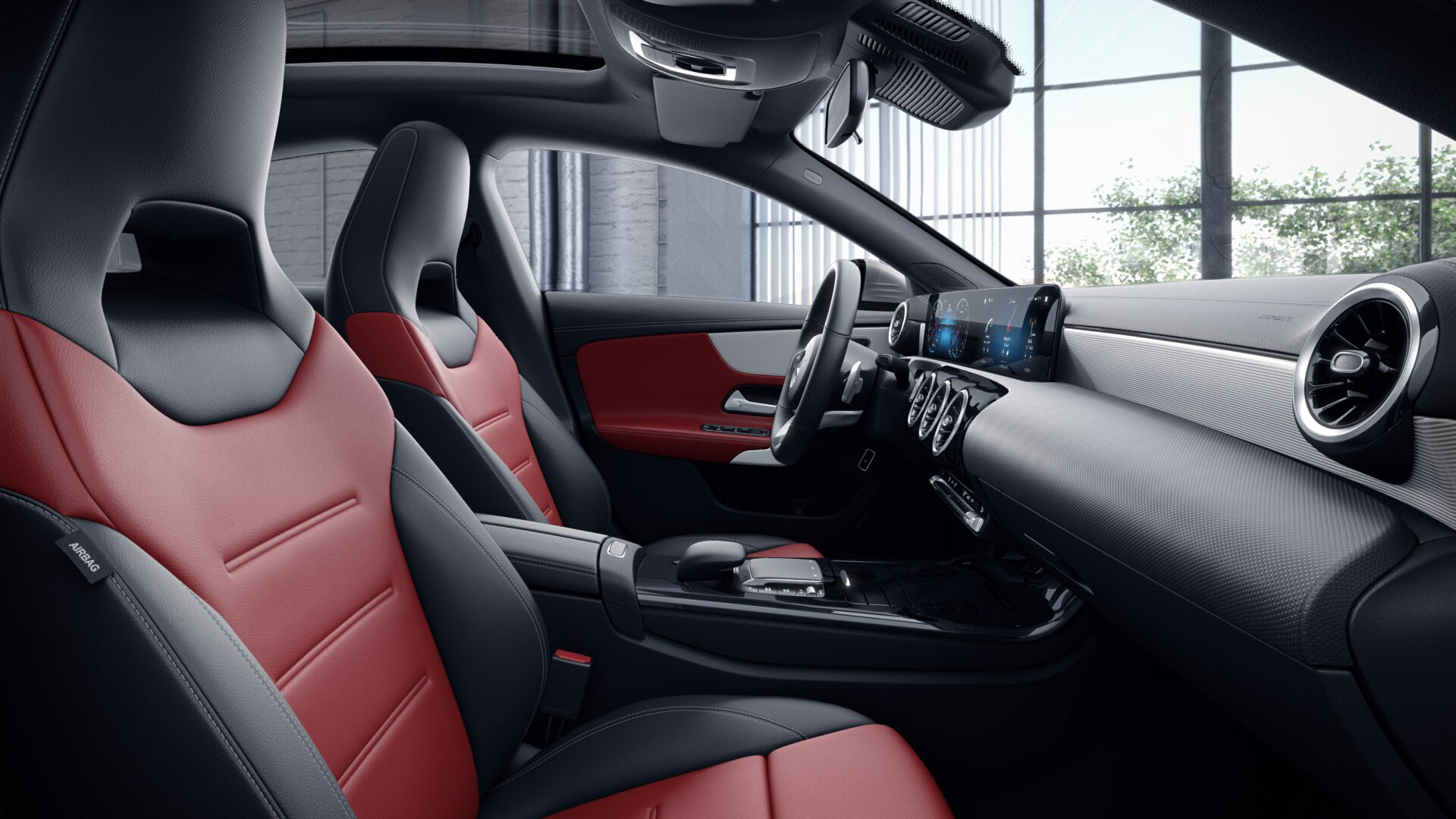 Poste de conduite de la Mercedes CLA Finition AMG Line + avec vue sur l’écran tactile, sellerie et la console centrale