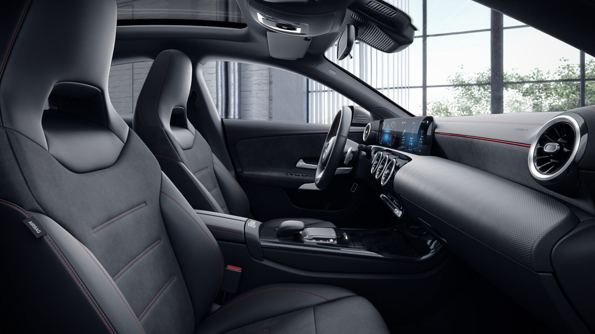 Poste de conduite de la Mercedes CLA Finition AMG Line avec vue sur l’écran tactile, sellerie et la console centrale