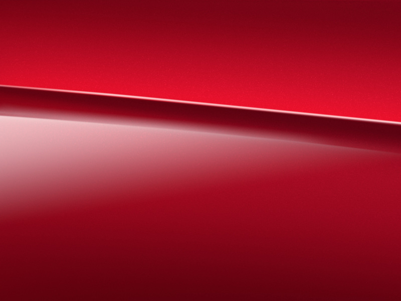 Vue de trois quarts de profil de la Mercedes Classe A avec la Peinture-MANUFAKTUR Rouge Patagonie métallisé